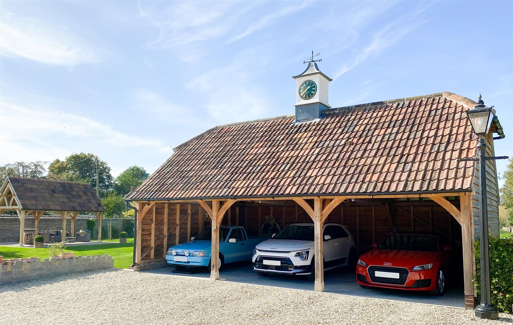3 Bay Oak Garage Featuring a Clock Tower