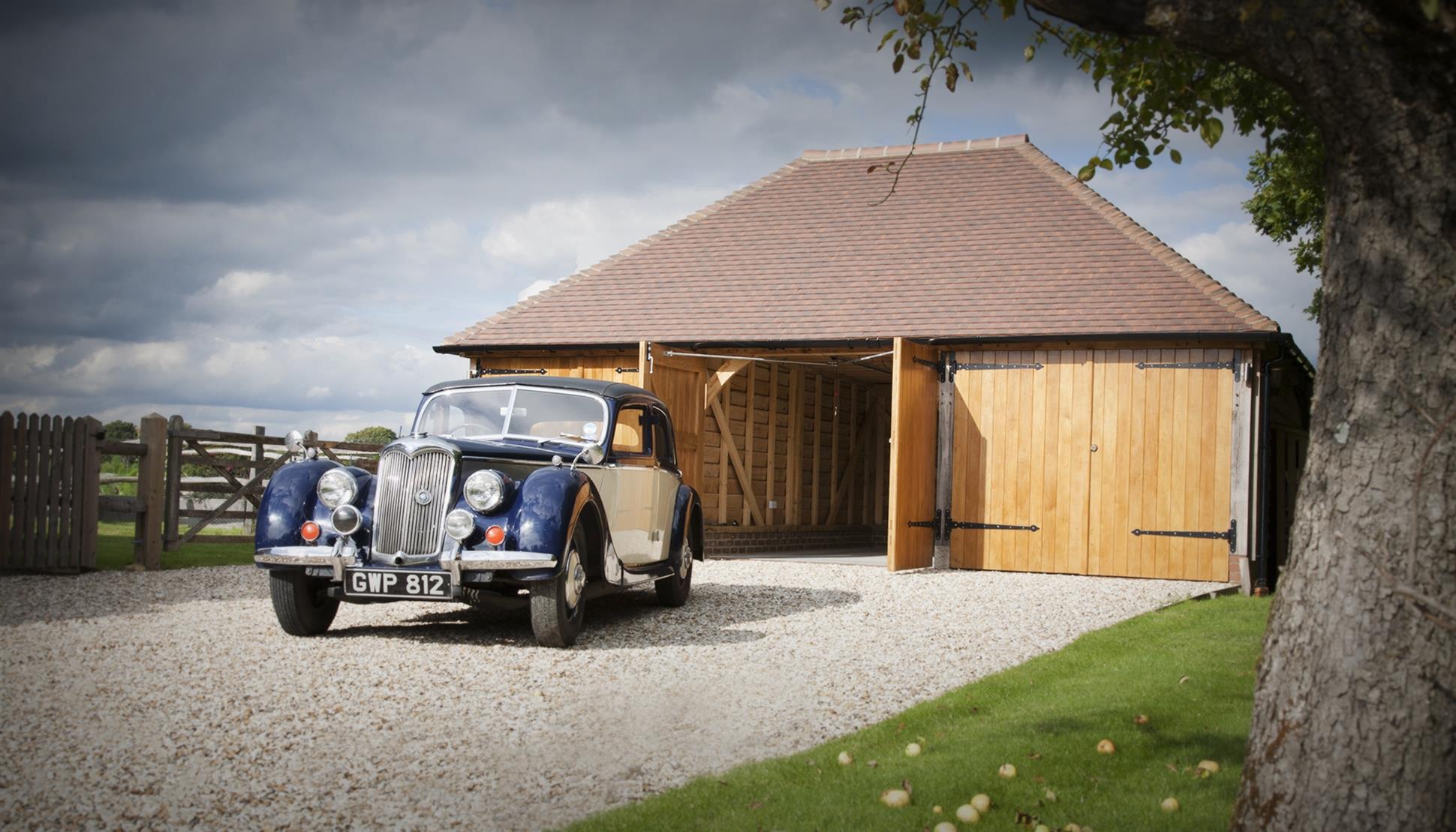 Classic Car Outside Oak Framed Garage