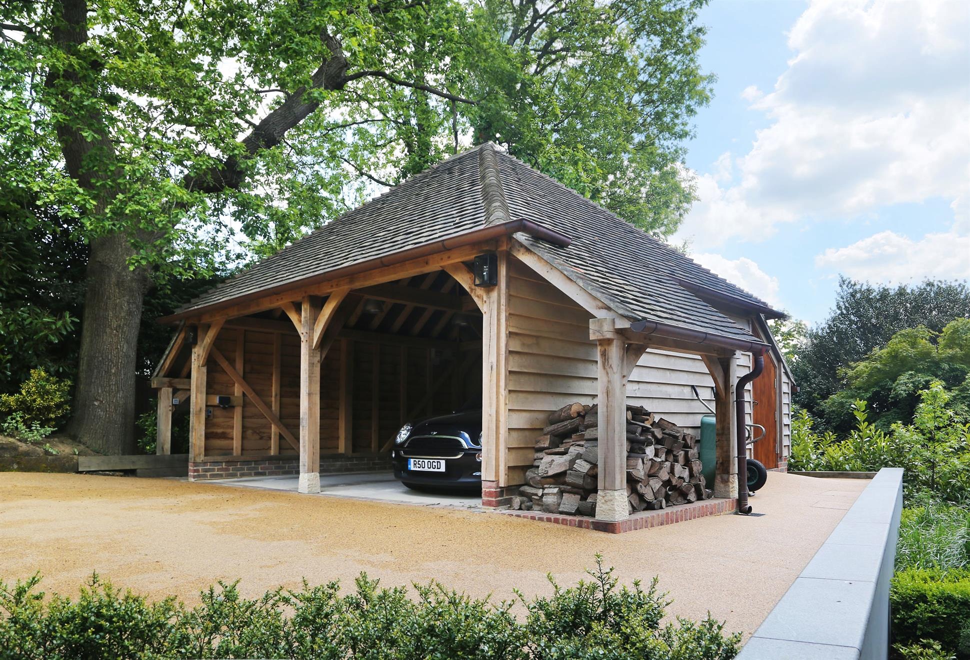 Custom 2 Bay Garage with Logstores Corner View