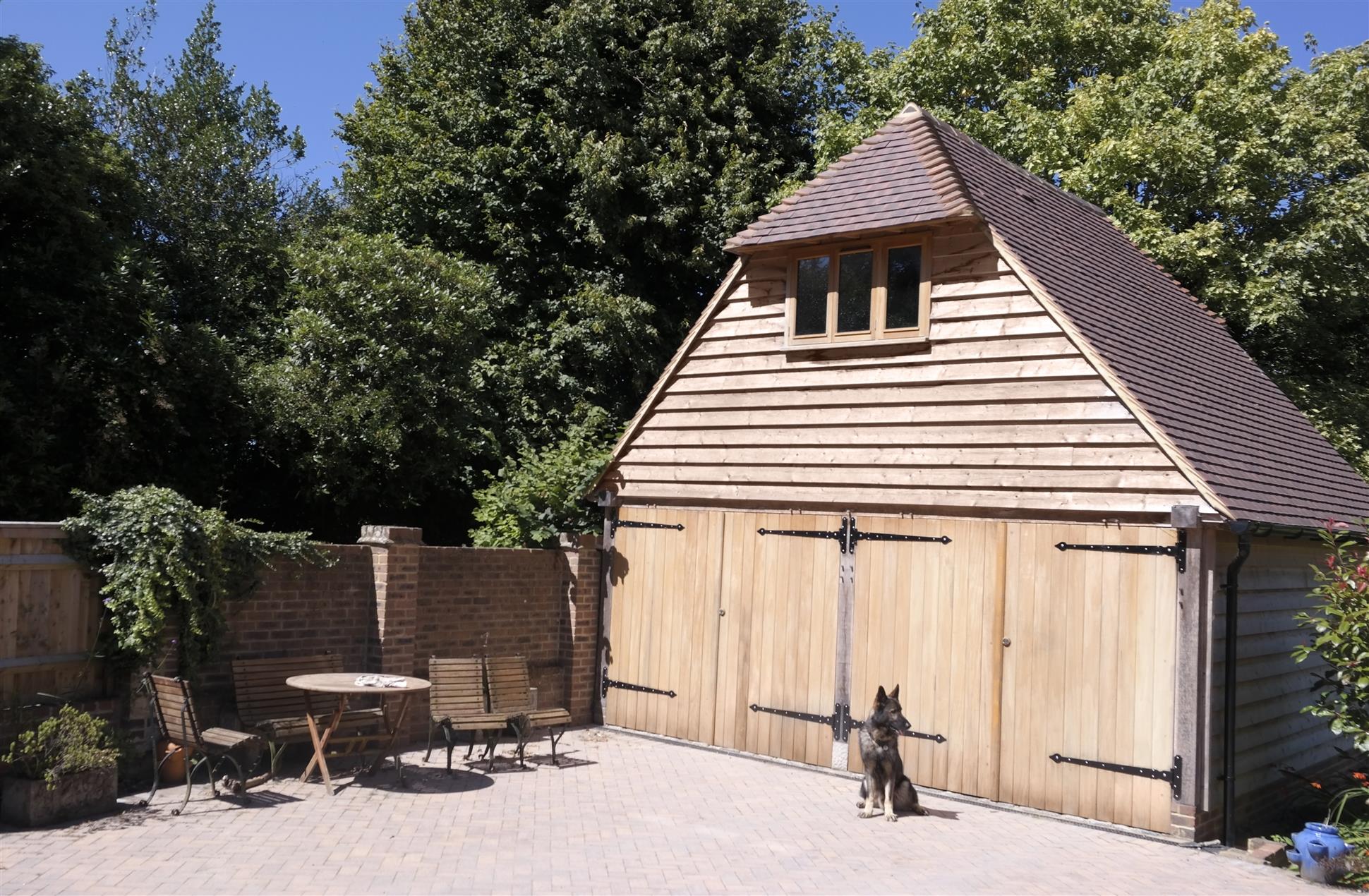Custom 2 Bay Oak Garage with Large First Floor