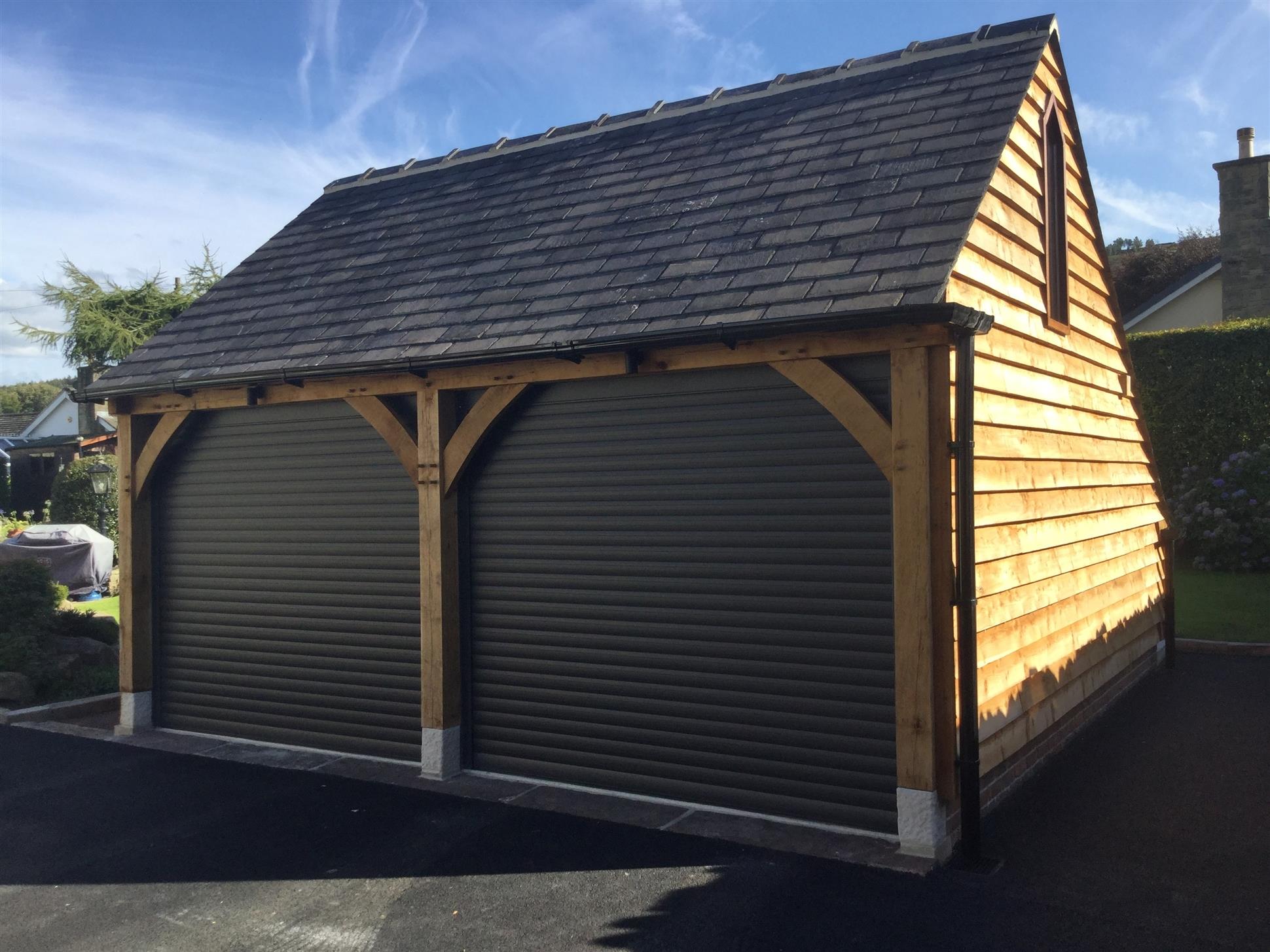 Oak Garage with Roller Shutter Doors